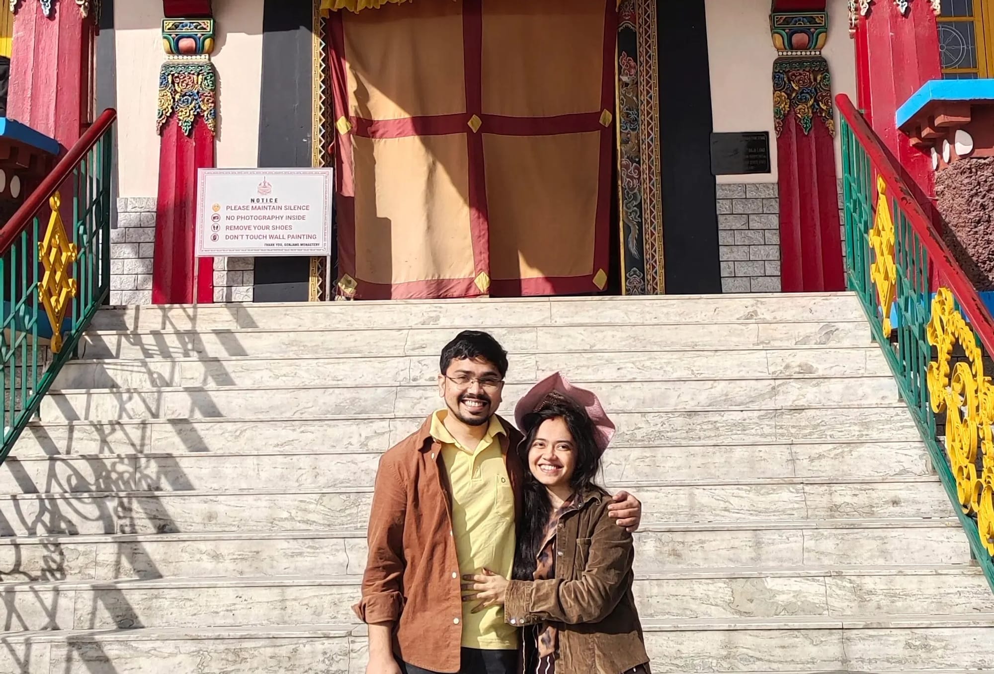 Amey and his partner getting a picture clicked in front of the Gonjang Monastery