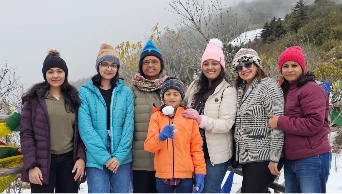 Group enjoying cold weather and scenic mountain landscapes during a Bhutan trip.
